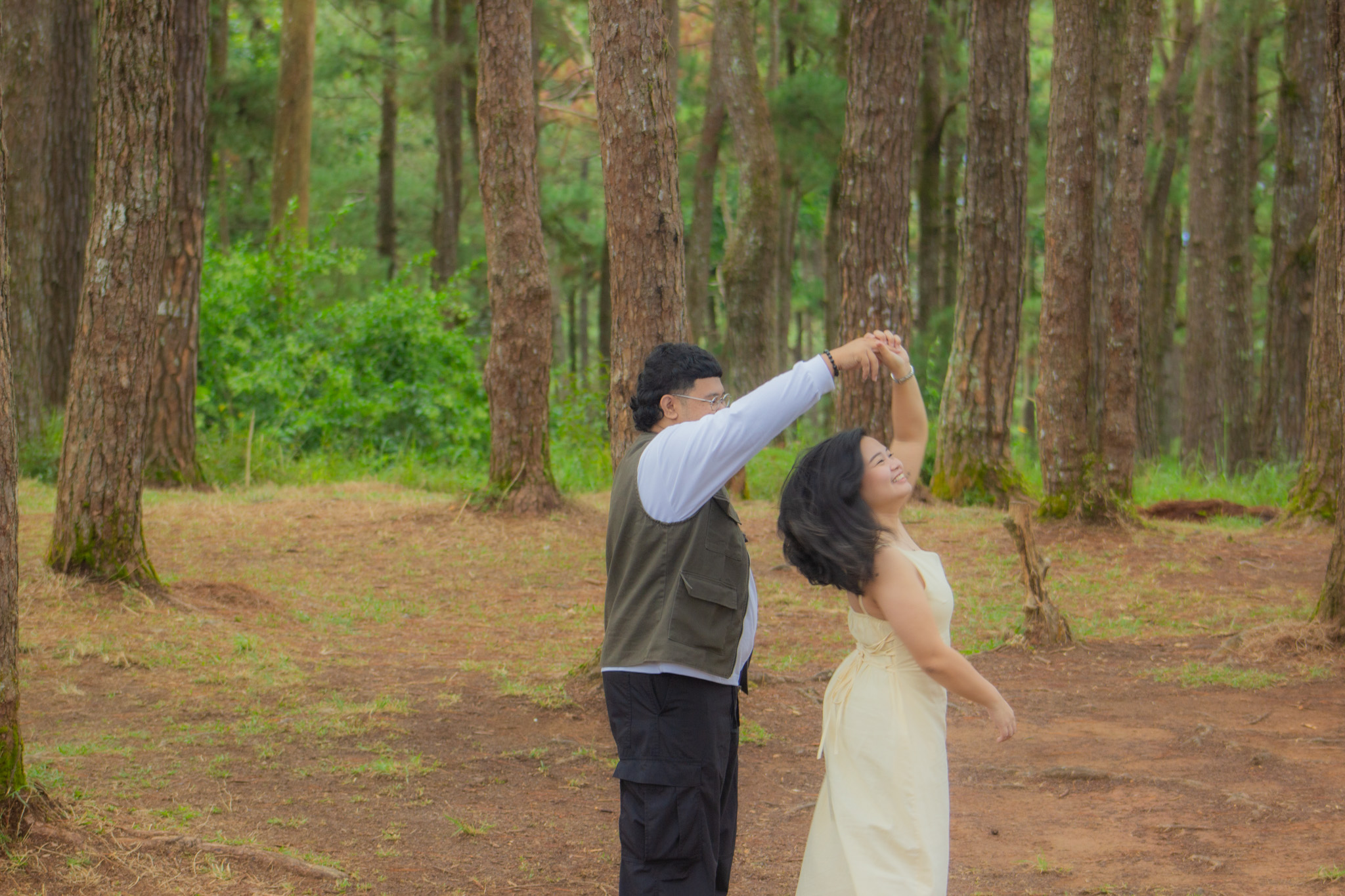 Martin and Carla dancing in the forest